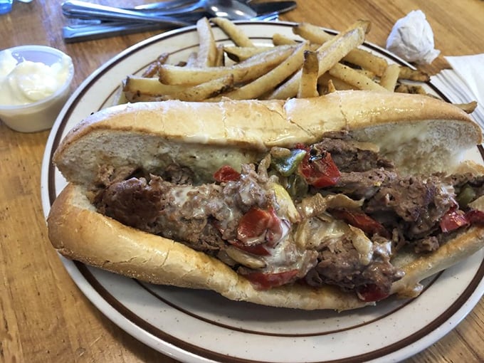 Behold the Philly cheesesteak that could make a Philadelphian consider moving to Vermont. It's a flavor explosion that'll have your taste buds doing the cha-cha.