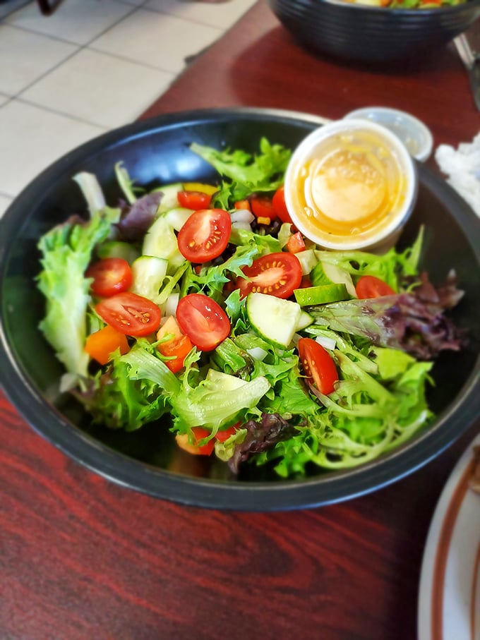 Who said salads can't be exciting? This bowl of greens is fresher than a '90s sitcom reboot and more colorful than a tie-dye festival. Your body will thank you, but your taste buds will be doing cartwheels.