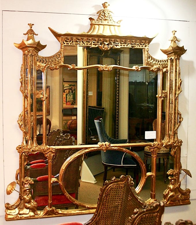 Mirror, mirror on the wall, who's the gaudiest of them all? This golden beauty screams "Liberace's powder room."