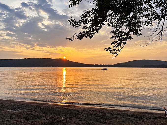 Sunset over Lake Dunmore: When the sky decides to outdo itself and turn the lake into liquid gold. No filter needed here!