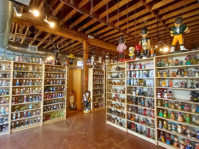 Wooden beams and exposed brick provide a rustic backdrop for this quirky collection of cultural artifacts.