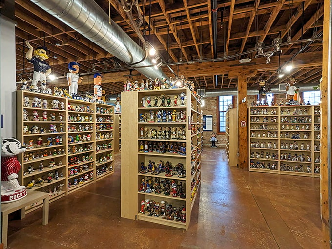 Floor-to-ceiling shelves create a labyrinth of nodding figures. It's like Where's Waldo, but everyone's head is moving!