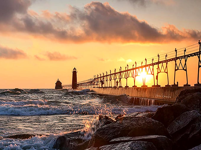 Grand Haven: Where lighthouses stand sentinel and sunsets paint the sky. Lake Michigan's own Hollywood ending, every single night. 