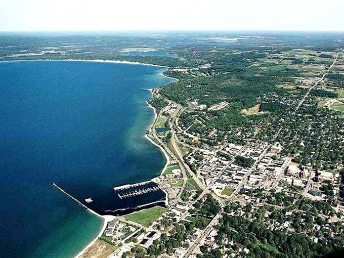 Petoskey's waterfront: Where boats play hide-and-seek with the horizon and every sunset is a standing ovation for Mother Nature. 