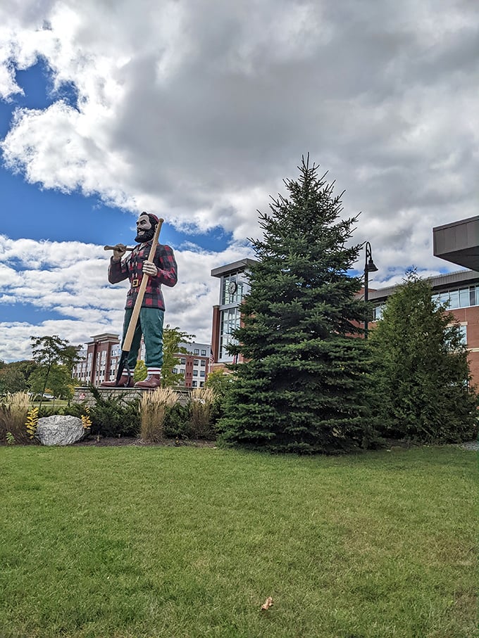 Axe-cellent photo op or looming threat? This Paul Bunyan statue stands tall in the face of Maine's quirkiness.