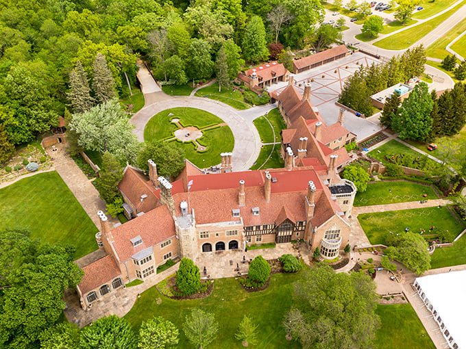 Meadow Brook Hall: "Talk about a bird's eye view! This aerial shot makes the mansion look like a fancy Monopoly piece on a lush green board."