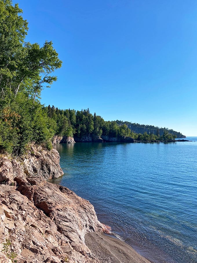 Lighthouse guardian: Tettegouche's beacon stands tall, a maritime superhero keeping watch over Lake Superior's moody waters.