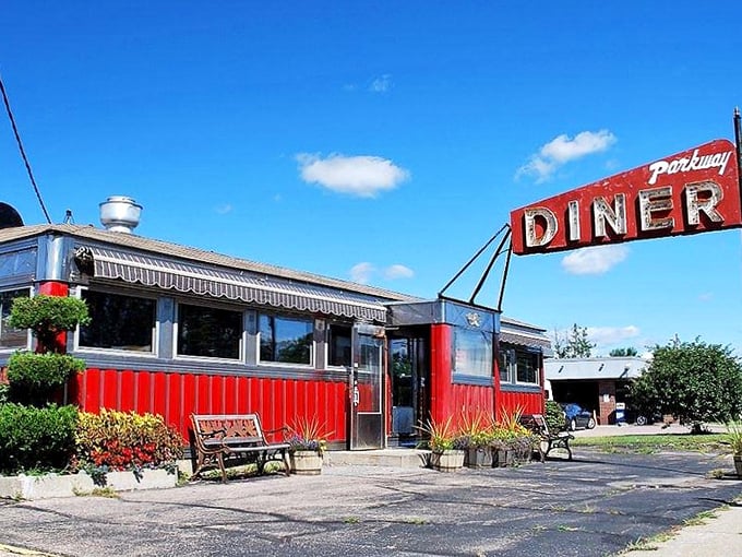 Chrome gleams and coffee steams at Parkway Diner. Where every booth feels like a time machine to simpler, tastier times.