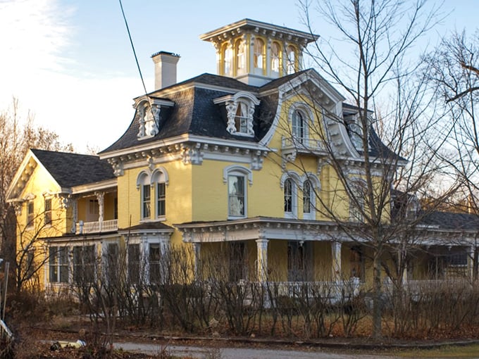 Highgate Manor: Sunshine yellow and Victorian charm. This cheery château is Vermont's answer to Belle's castle.