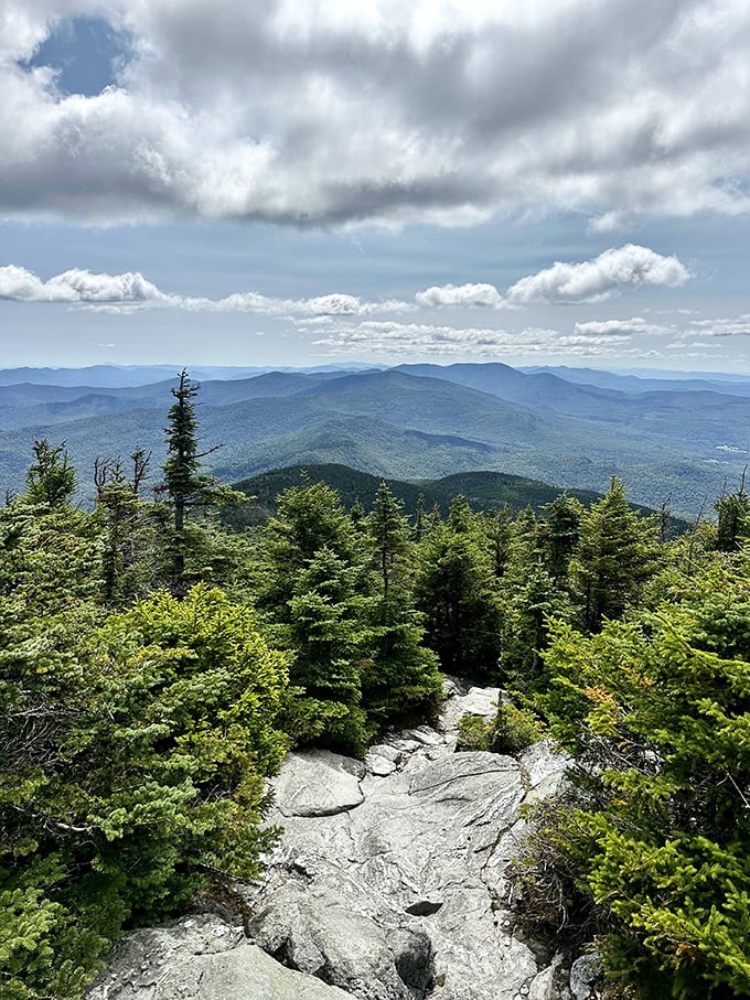 Hiking Camel's Hump: Where the air is thin, but the views are thick with beauty.