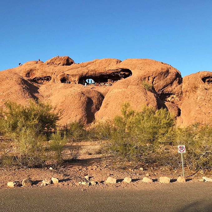 "Hole-y" moly! This natural rock formation looks like Mother Nature's attempt at Swiss cheese. Talk about a view with a side of geological humor!