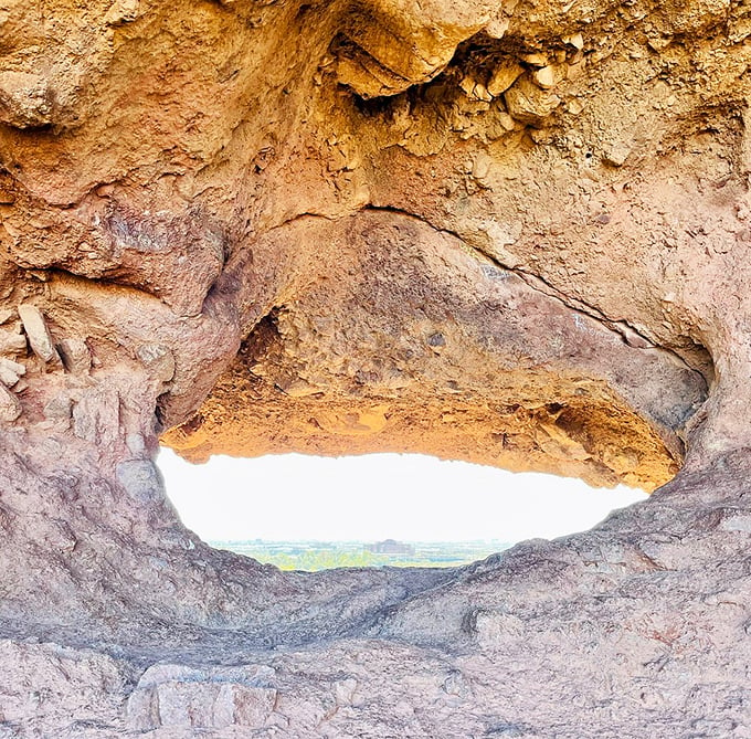 Step into nature's picture frame! This rocky window offers a view so stunning, it'll make your vacation photos look like they've been professionally curated.