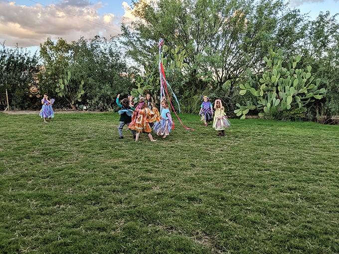 May Day meets the Wild West in this charming scene. It's like "Little House on the Prairie" got a magical makeover.