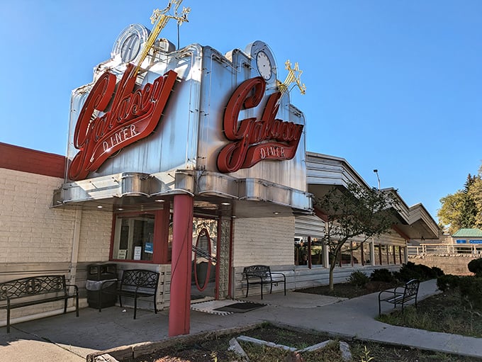 Beam me up, Scotty! This cosmic diner's neon sign is brighter than a supernova and twice as inviting.