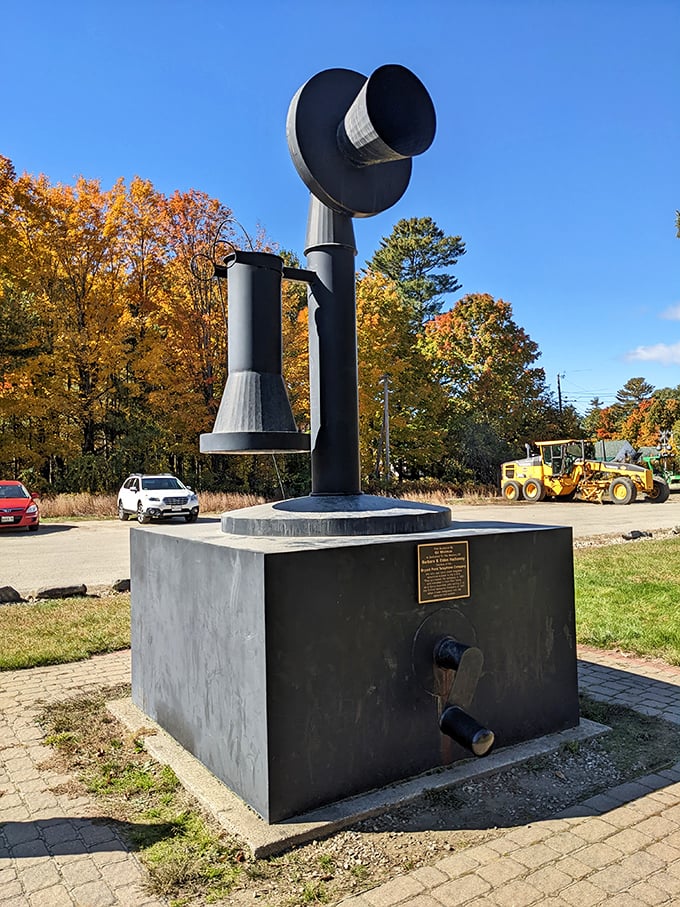 Autumn leaves frame this telephonic titan. It's like Alexander Graham Bell met Paul Bunyan and said, "Let's supersize this invention!"