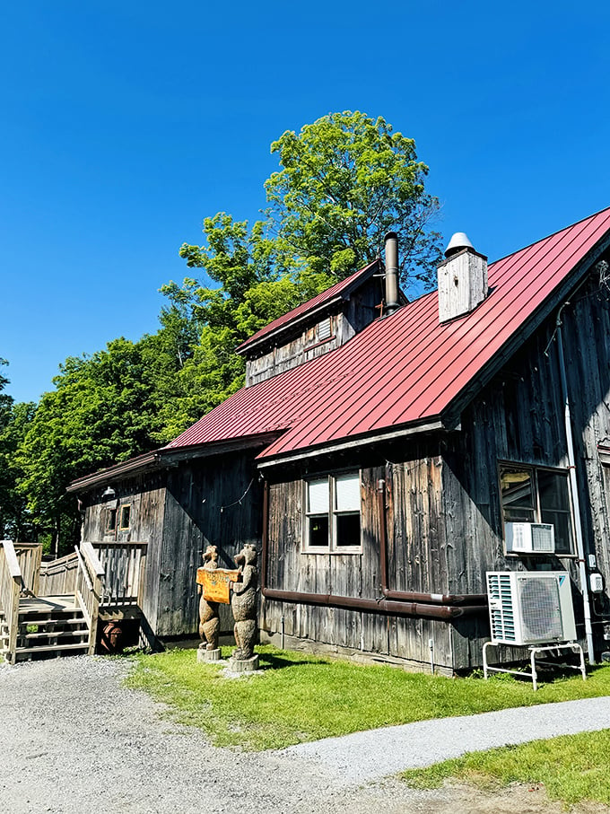 Rustic charm meets maple-infused magic! This weathered wooden wonder looks like it's been whispering sweet Vermont secrets since Paul Bunyan was in diapers.