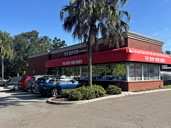 A slice of the Big Apple in the Sunshine State! The New York Diner's red awning beckons like a beacon of hope for homesick New Yorkers and curious Floridians alike.