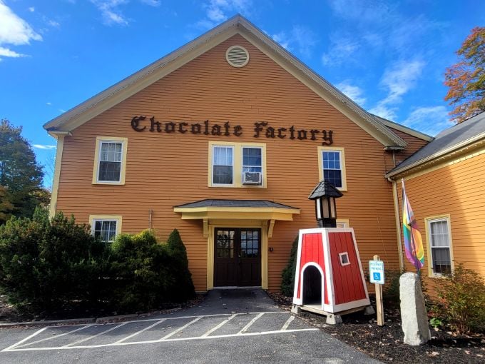 Welcome to chocolate heaven! This mustard-yellow building isn't just a factory, it's a portal to your sweetest childhood dreams.