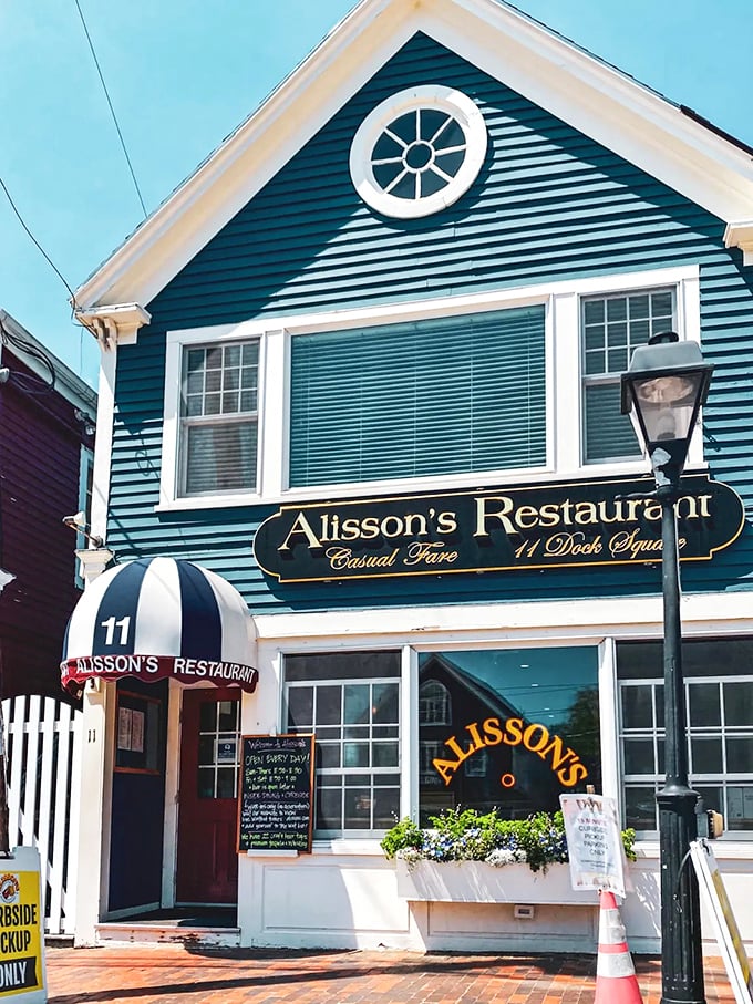 A classic New England facade in deep green and crisp white welcomes visitors to Alisson's, where seafood dreams come true in Kennebunkport. Photo credit: The Detailed Local