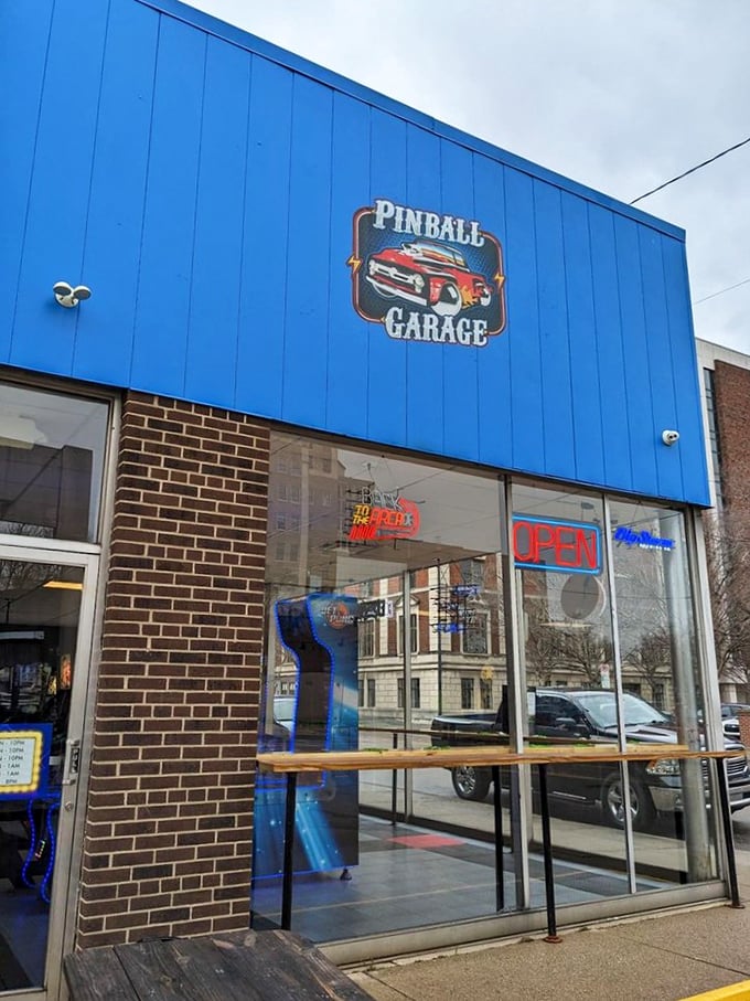 Blue skies and pinball dreams! This vibrant facade is like a siren call to your inner child, promising endless quarters of fun.