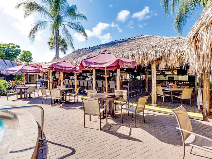 Thatched-roof paradise alert! Harold's Place beckons with its tropical charm, promising cold drinks and island vibes just steps from the Florida mainland.