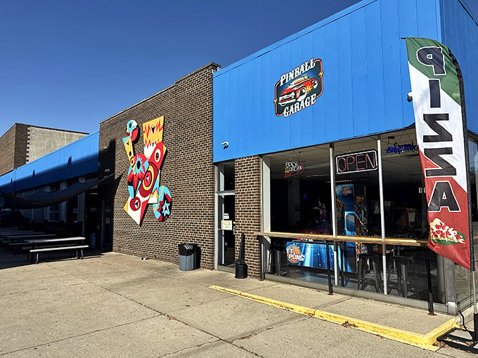 Blue skies and pinball dreams! This vibrant facade is like a siren call to your inner child, promising endless quarters of fun.