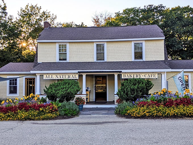 A slice of New England charm! This yellow-clad bakery looks like it jumped straight out of a Norman Rockwell painting, complete with a flower garden that'd make Mother Nature jealous. Photo credit: Jeremy Edmunds