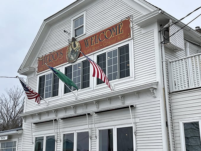 A slice of Americana, served with a side of charm! Hero's Welcome stands proud, its white clapboard exterior and patriotic flags beckoning hungry travelers and history buffs alike.